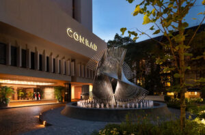 Conrad Singapore Orchard Entrance Evening 02 webp