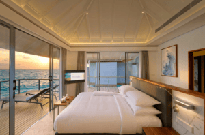 OUTRIGGER Maldives Maafushivaru Resort Over Water Villa Bedroom