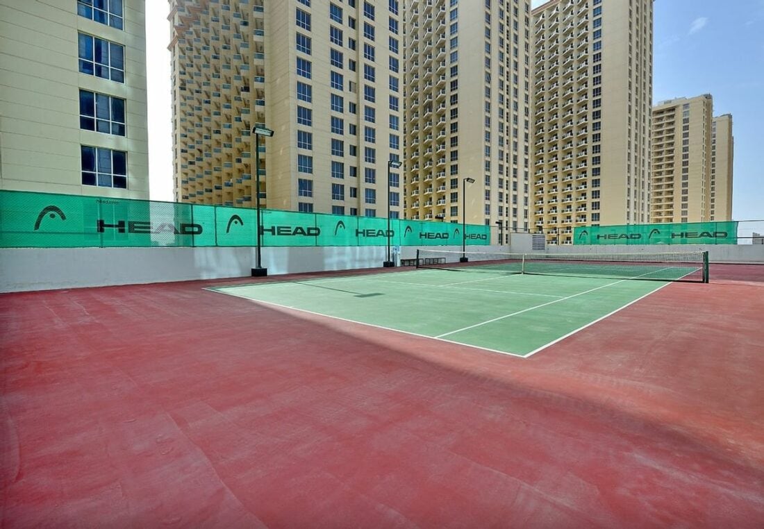 ghaya grand hotel dubai tennis court