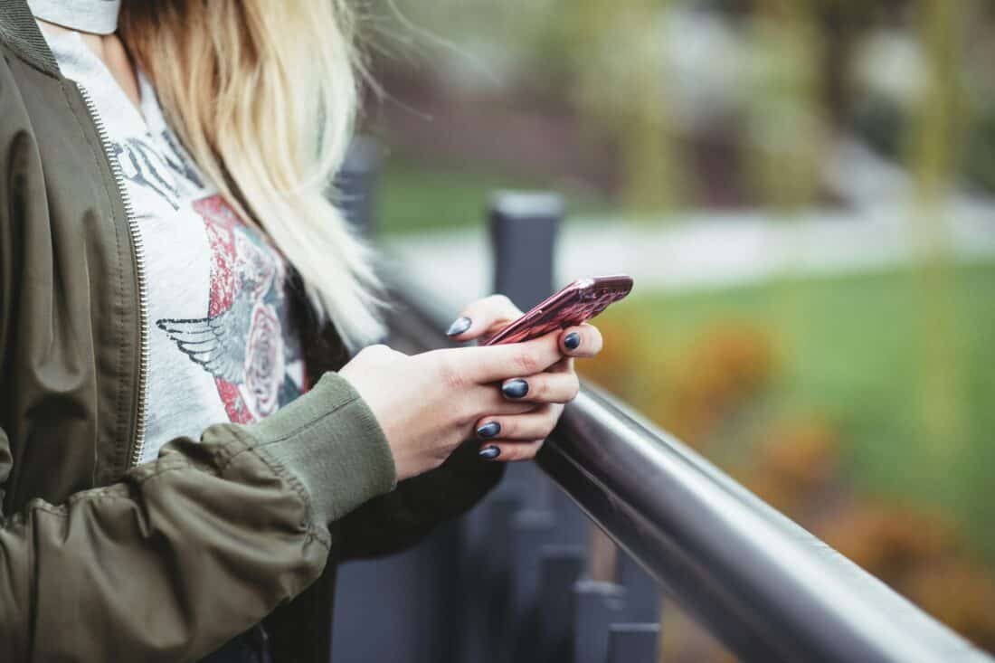 woman with smartphone in her hands