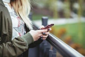 woman with smartphone in her hands